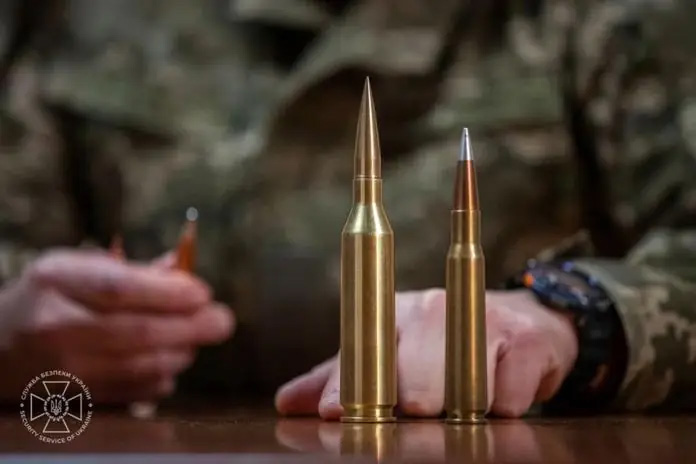 12.7×114"HL on the left, .50 BMG on the right 12.7×114"HL on the left, .50 BMG on the right