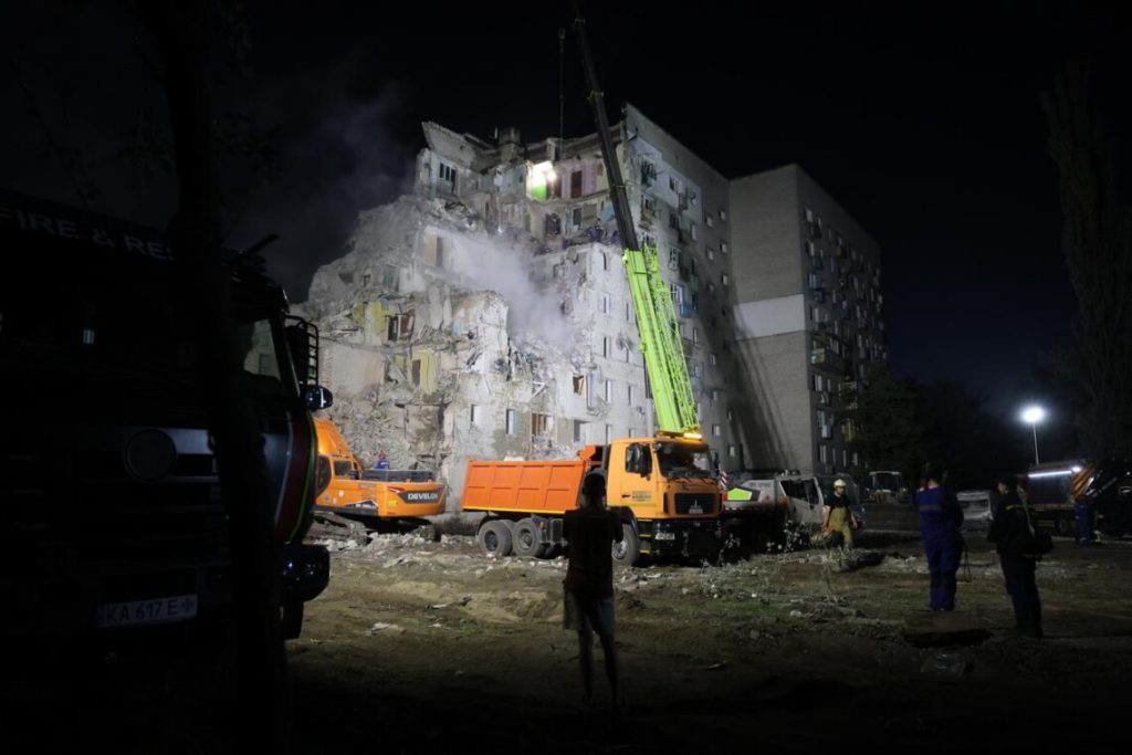 Rescue operation at the destroyed apartment building Rescue Workers Clear the Rubble of an Apartment Building Destroyed by a Russian Missile Overnight